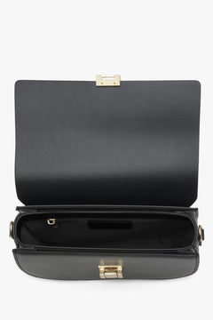 Women's black leather shoulder bag - close-up on the interior.