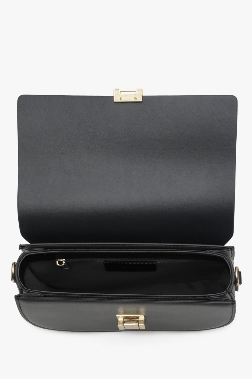 Women's black leather shoulder bag - close-up on the interior.