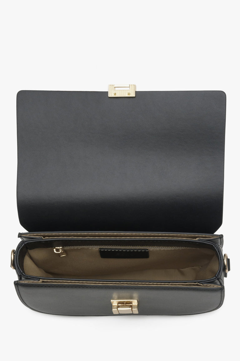 Women's black leather shoulder bag - close-up on the interior.