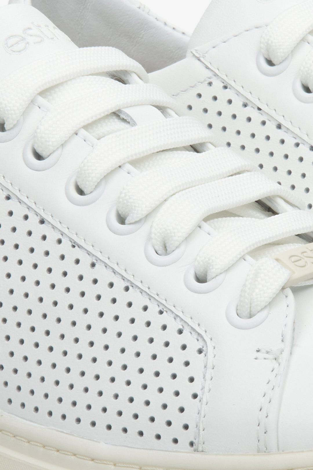 Women's white Estro fall/spring sneakers - close-up on details.