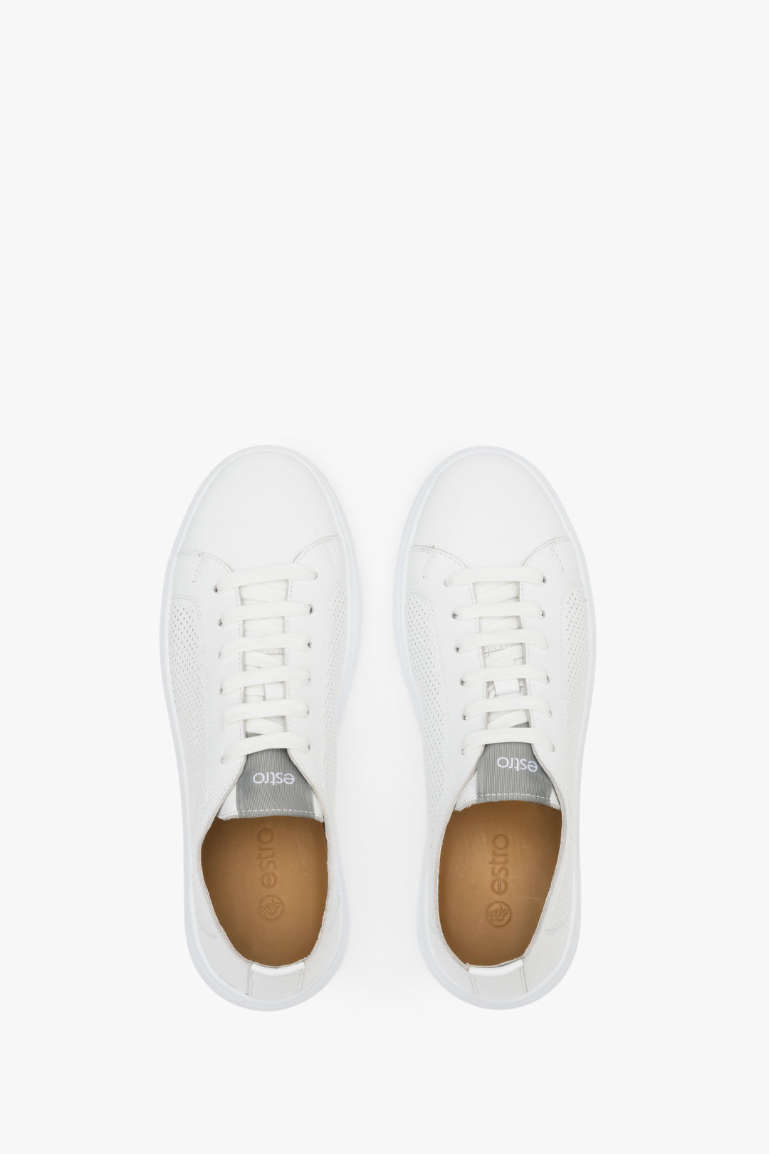 Men's white leather perforated sneakers - presentation of the footwear from above.