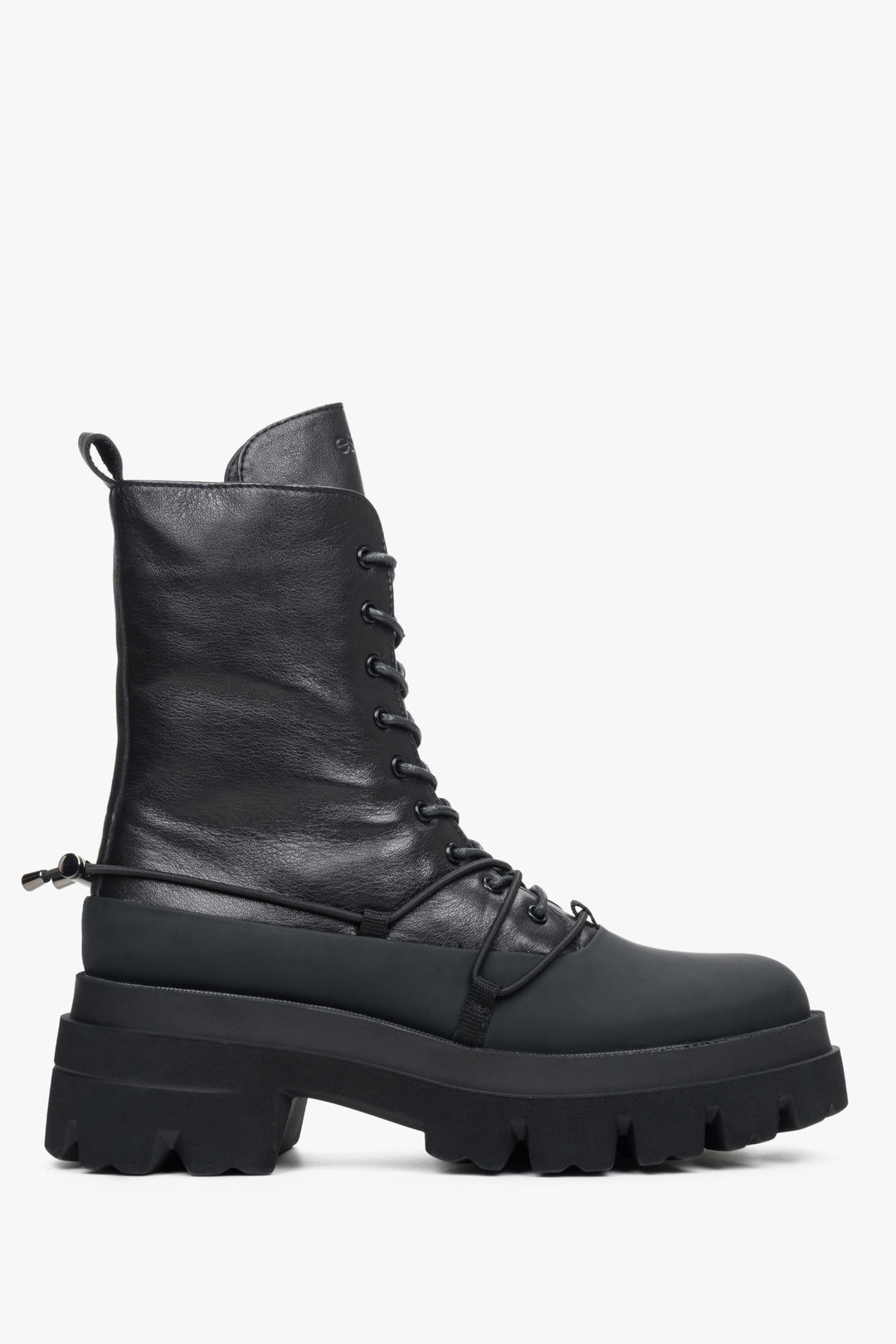 Women's high boots made of natural leather with laces by Estro - close-up on the shoe profile.