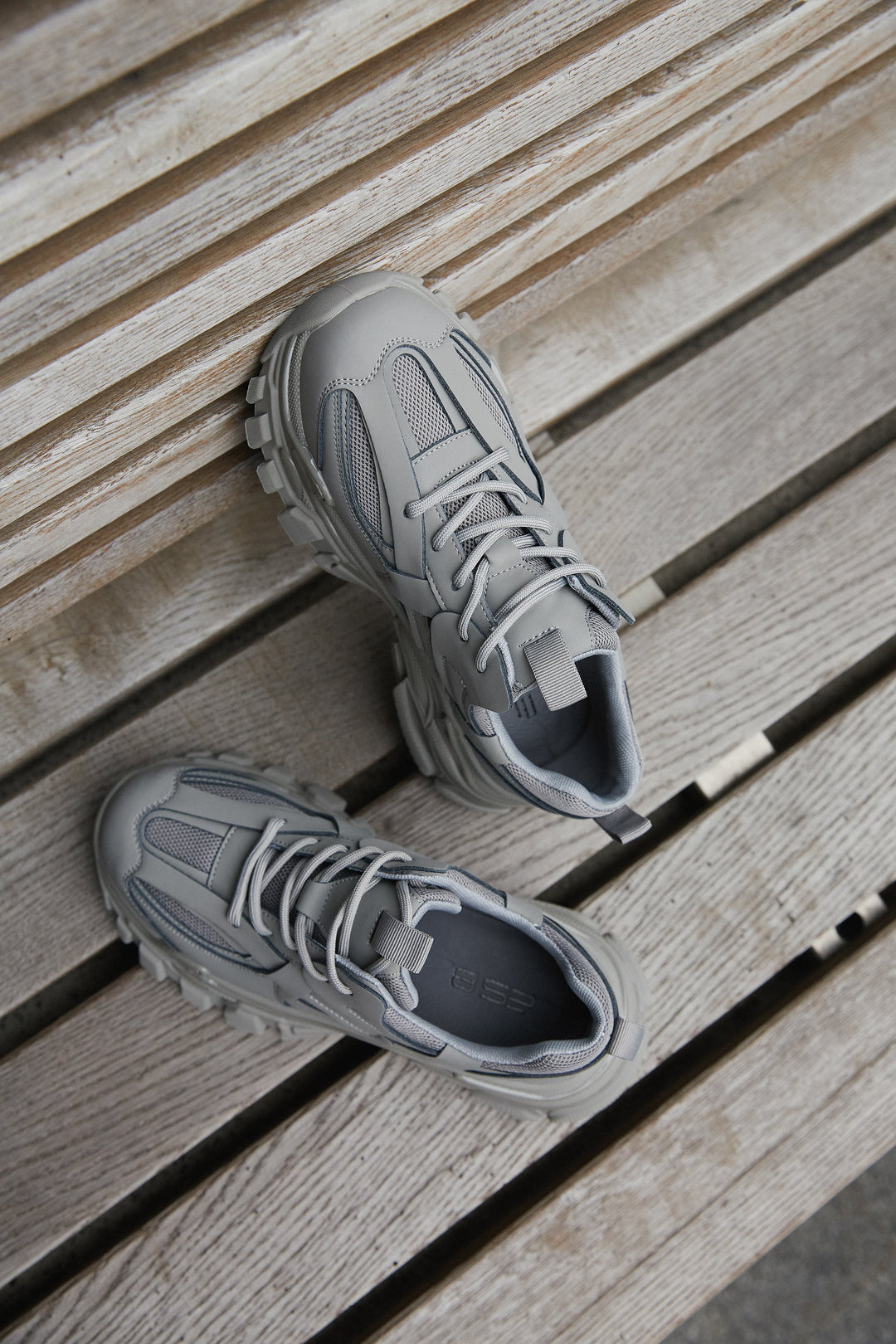 Women's grey sneakers with a trick sole.