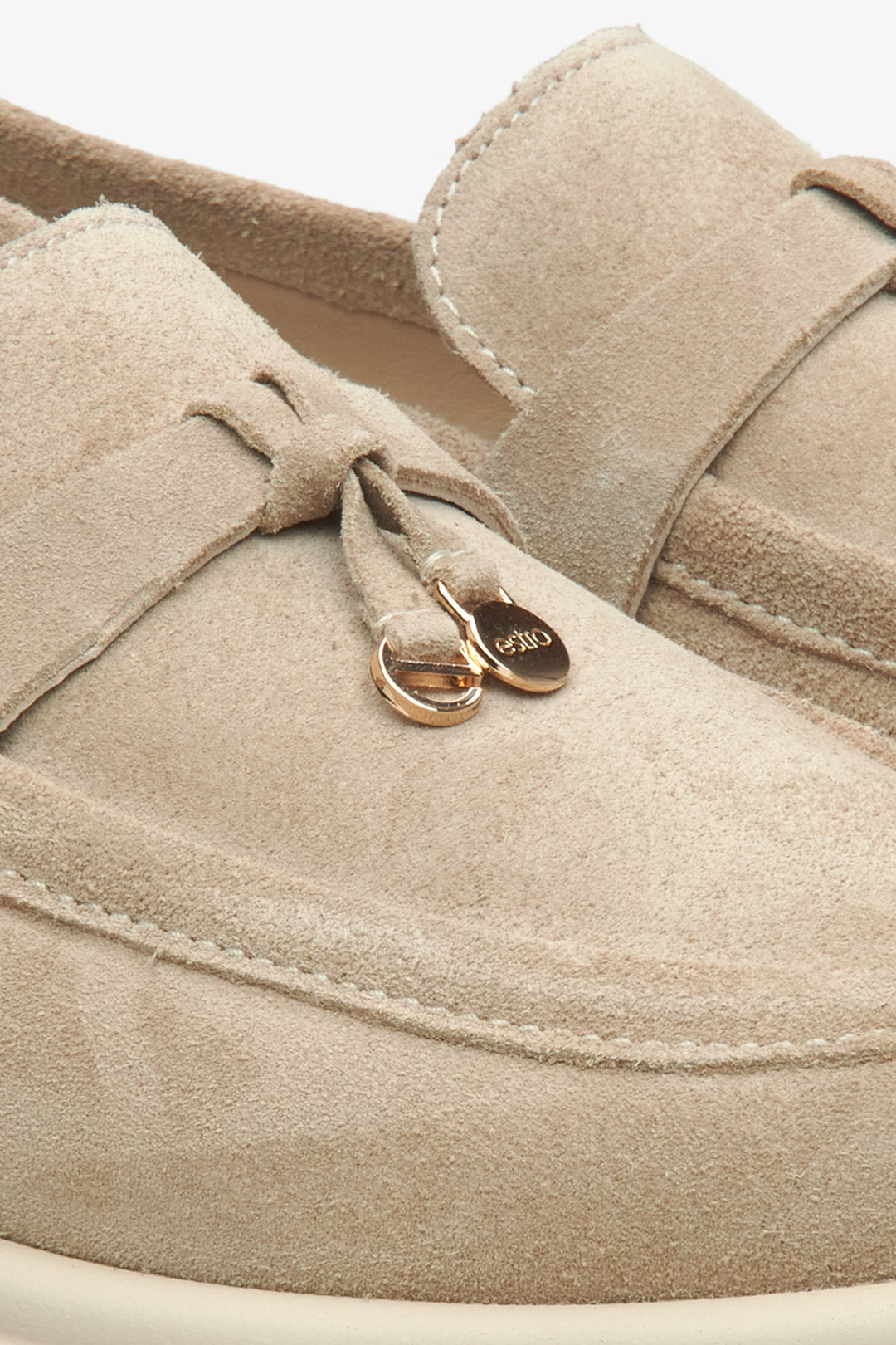 Estro light brown velour women's moccasins - close-up on detail.