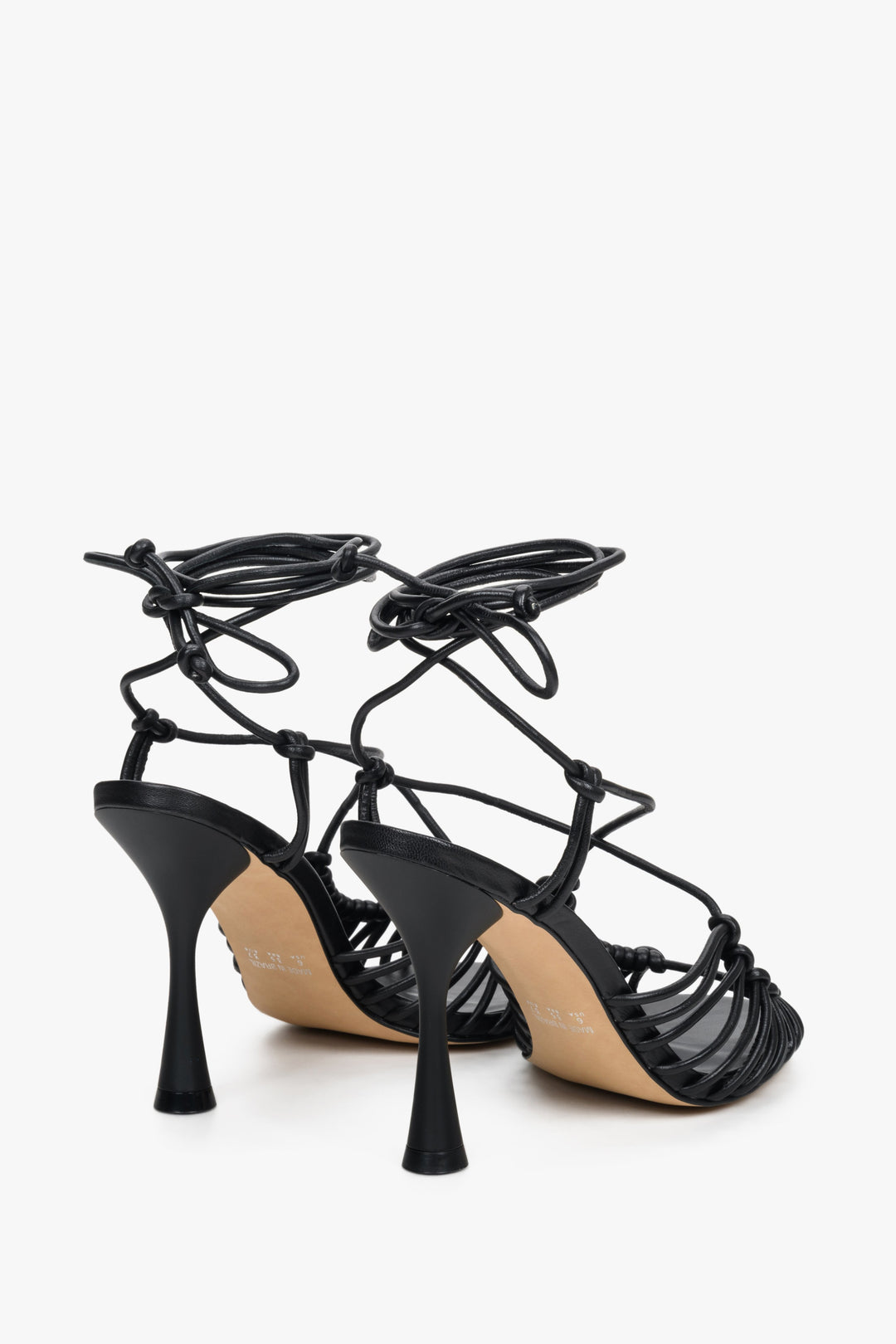 Women's black high heel sandals by Estro - close-up on the back of the shoe.