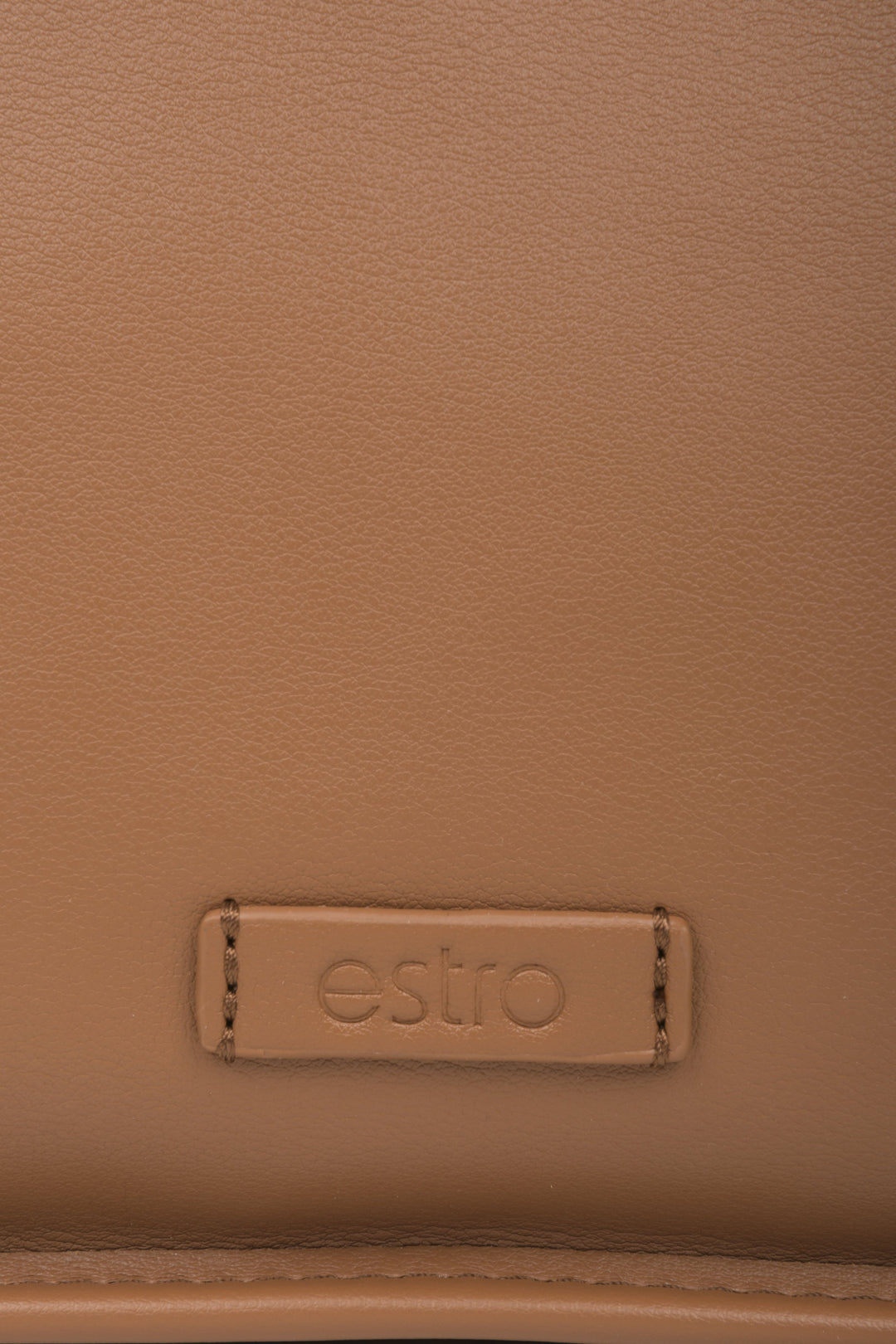 Women's brown leather shoulder bag - close-up on the details.