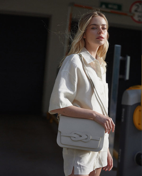 Beige Italian Leather Shoulder Bag by Estro - presenting on a model.