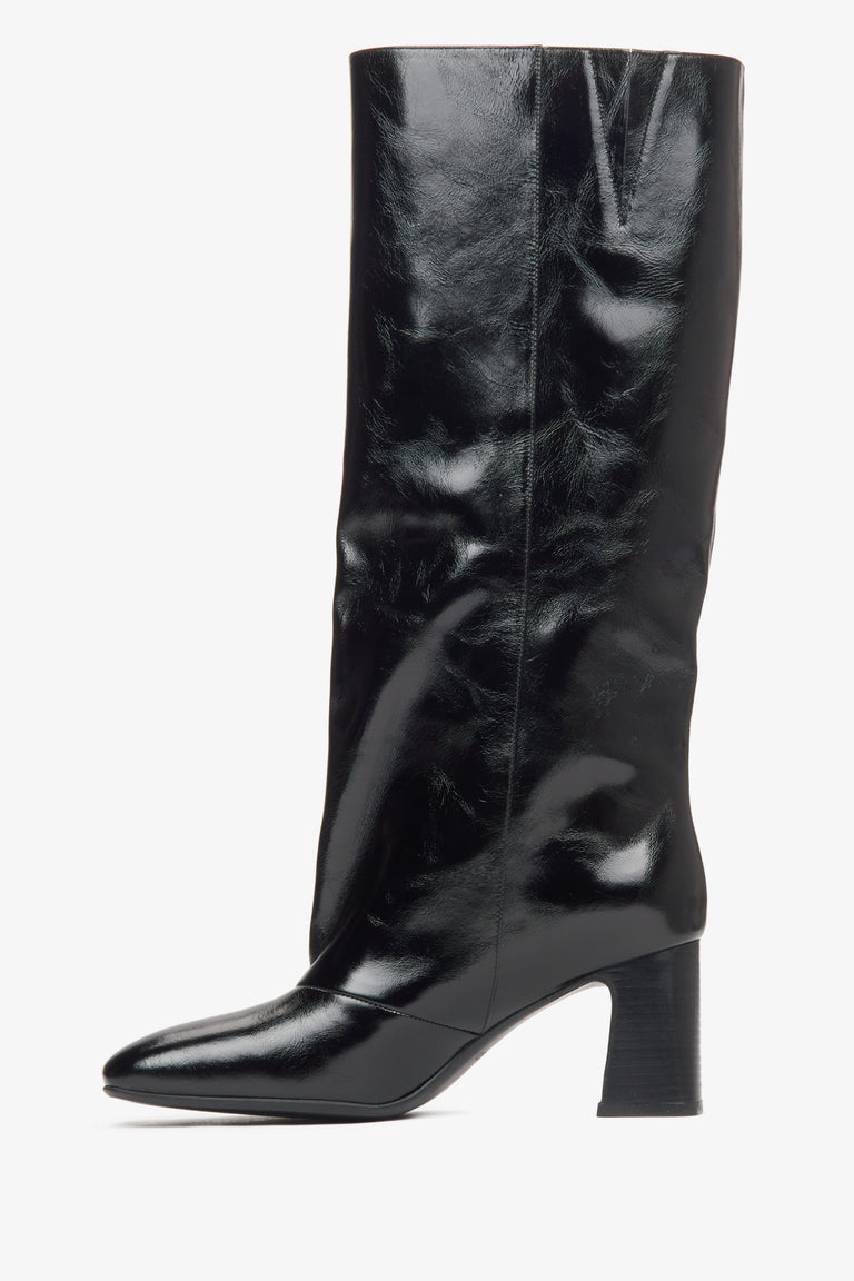 Women's black high-heeled boots made of patent genuine leather with a wide shaft Estro - shoe profile.