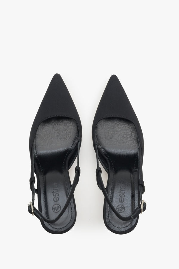 Black slingback women's shoes on a heel with pointed toe.