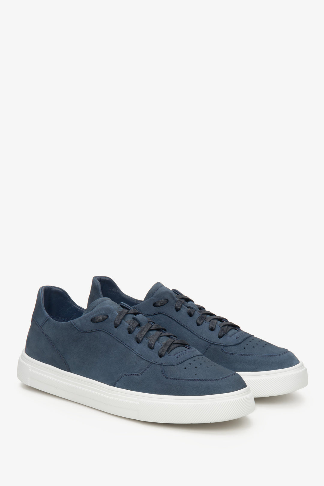 Men's blue nubuck sneakers with lacing for spring - presentation of the toe cap and side seam of the shoe.
