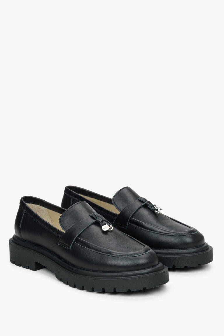 Women's black leather loafers by Estro.