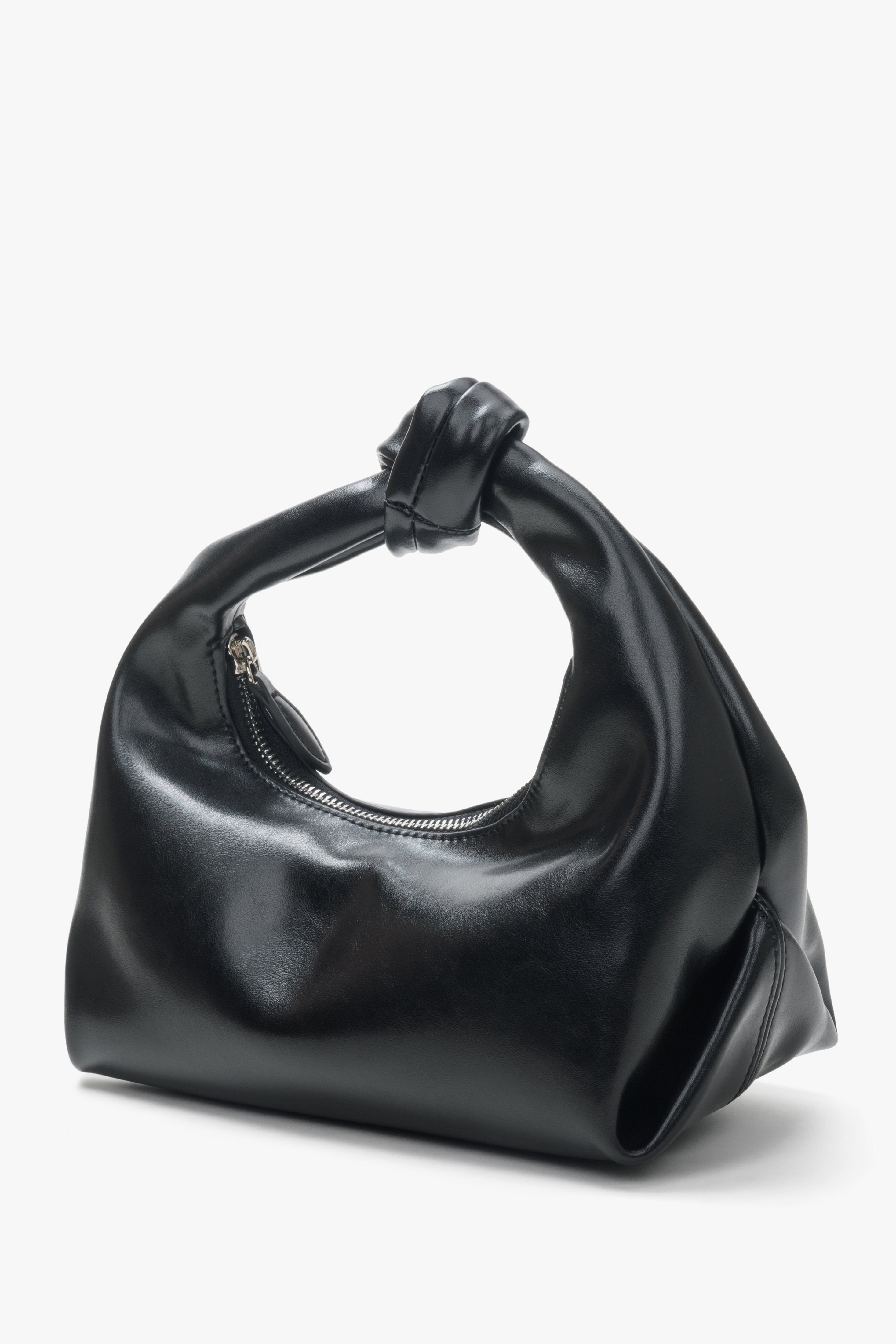  Women's small black evening bag by Estro.