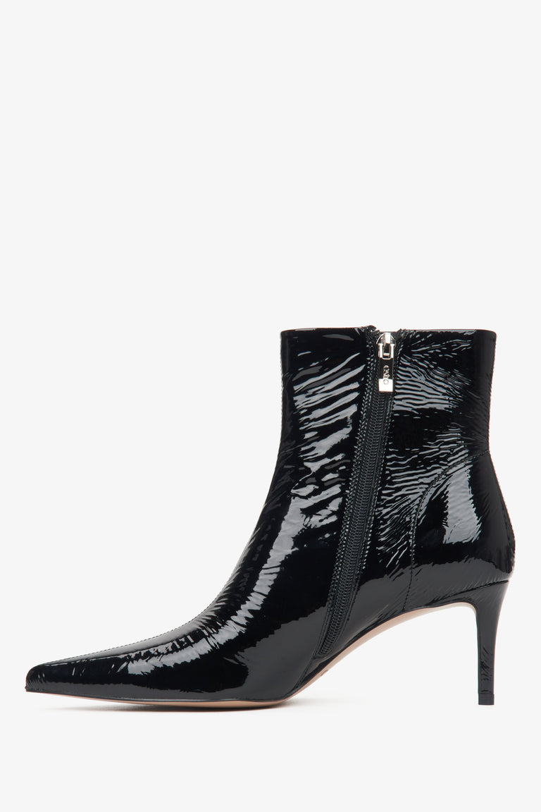 Black leather women's ankle boots on a stiletto heel by Estro – side profile of the shoe.