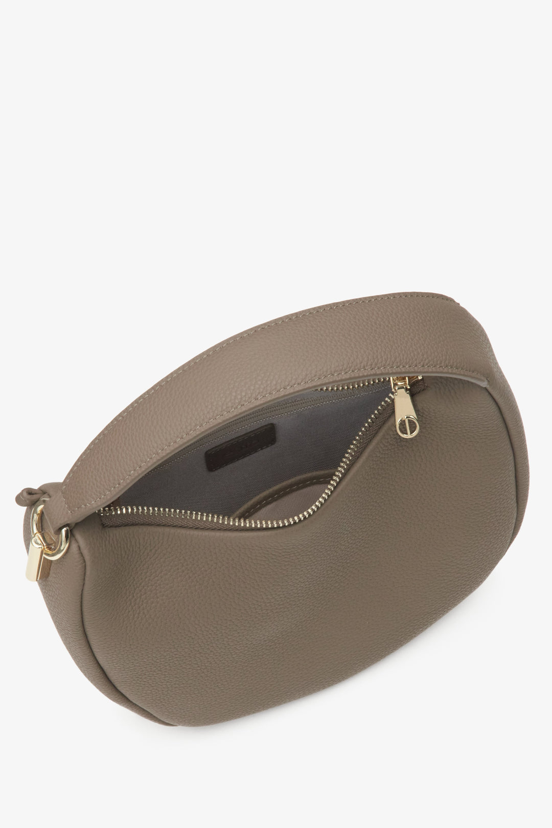 Close-up of the interior of the brown leather women's crescent-shaped handbag by Estro.
