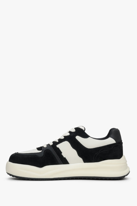 Women's black and white sneakers made of leather and velour.