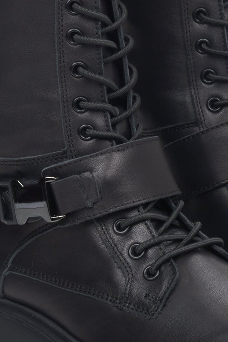 Women's black leather combat boots with laces by Estro - close-up on the details.