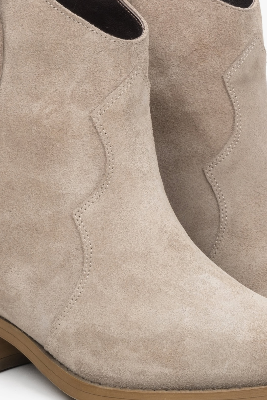 Women's beige velour pointed-toe cowboy boots by Estro.