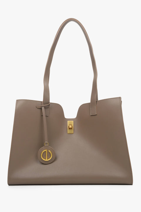 Women's brown leather shopper bag with decorative strap by Estro.