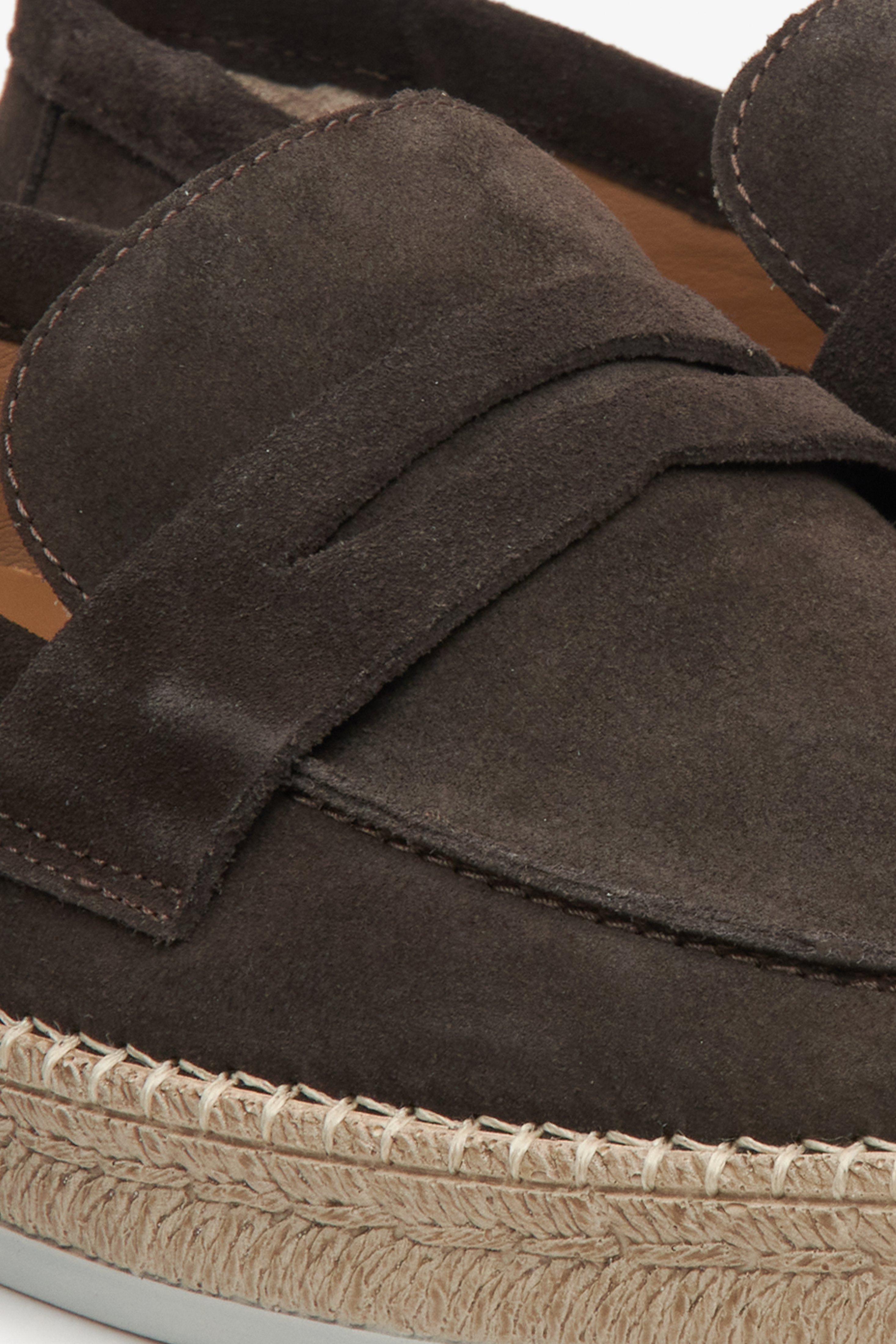 Men's dark brown velour moccasins - close-up on detail.