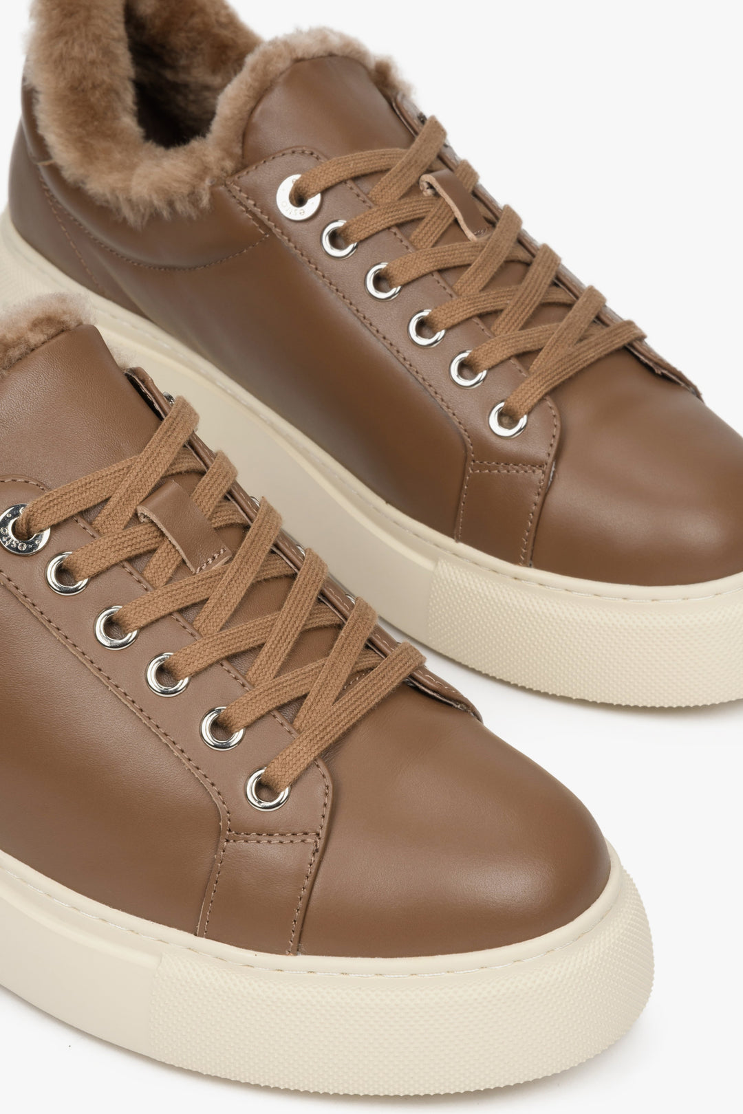 Leather, insulated women's brown sneakers by Estro - front part of the shoe.