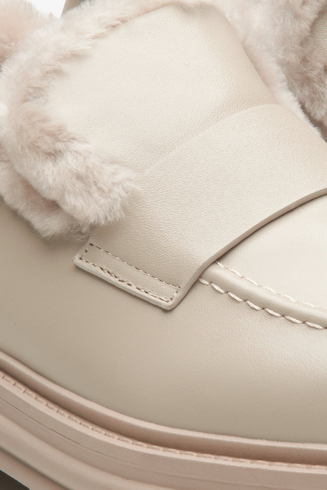 Leather beige women's moccasins by Estro with winter insulation - close-up on the details.