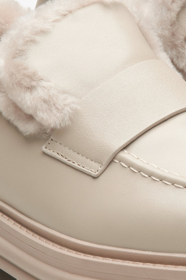 Leather beige women's moccasins by Estro with winter insulation - close-up on the details.