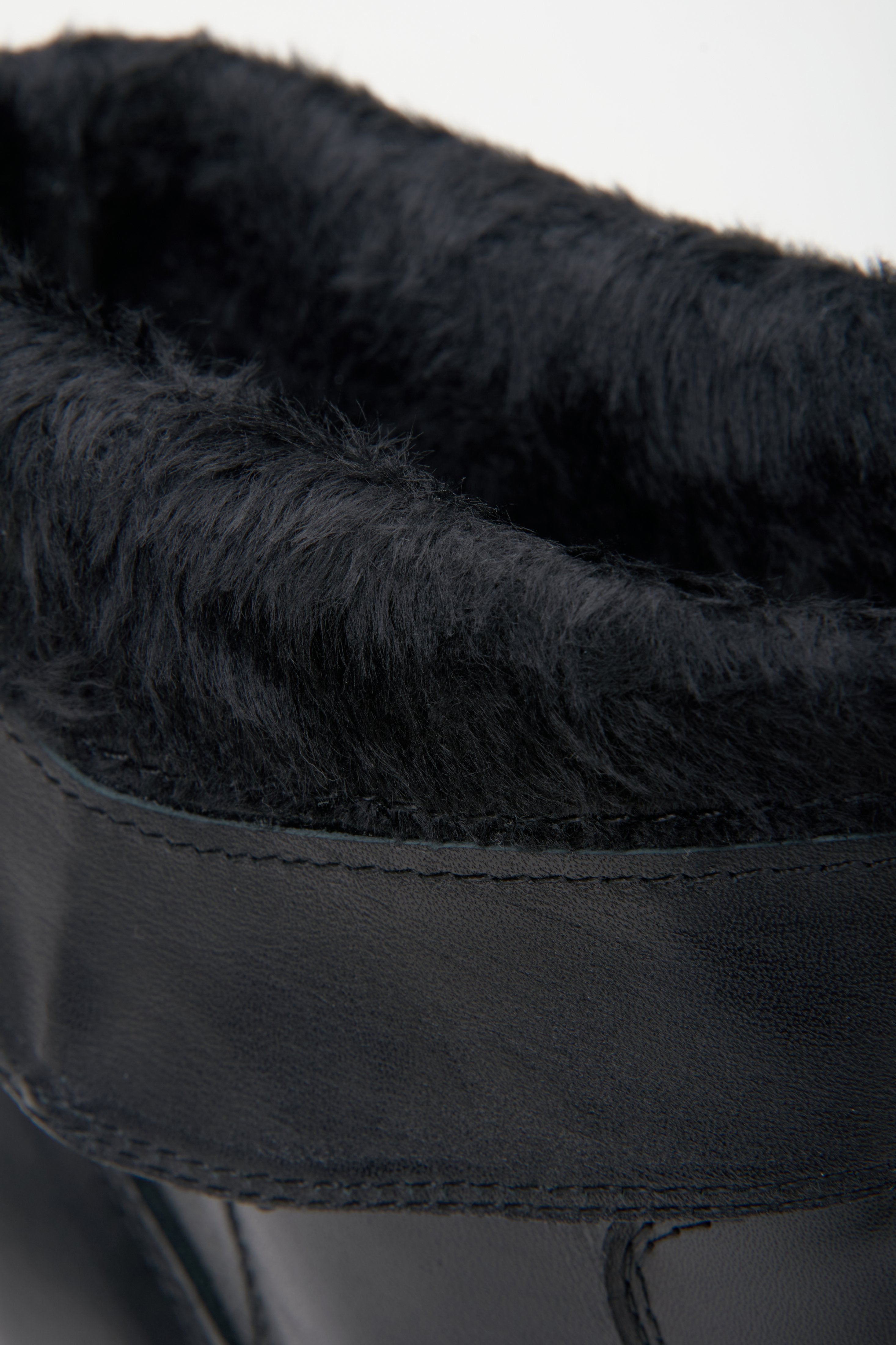 Black cowboy boots made of suede Estro - a close-up on details.