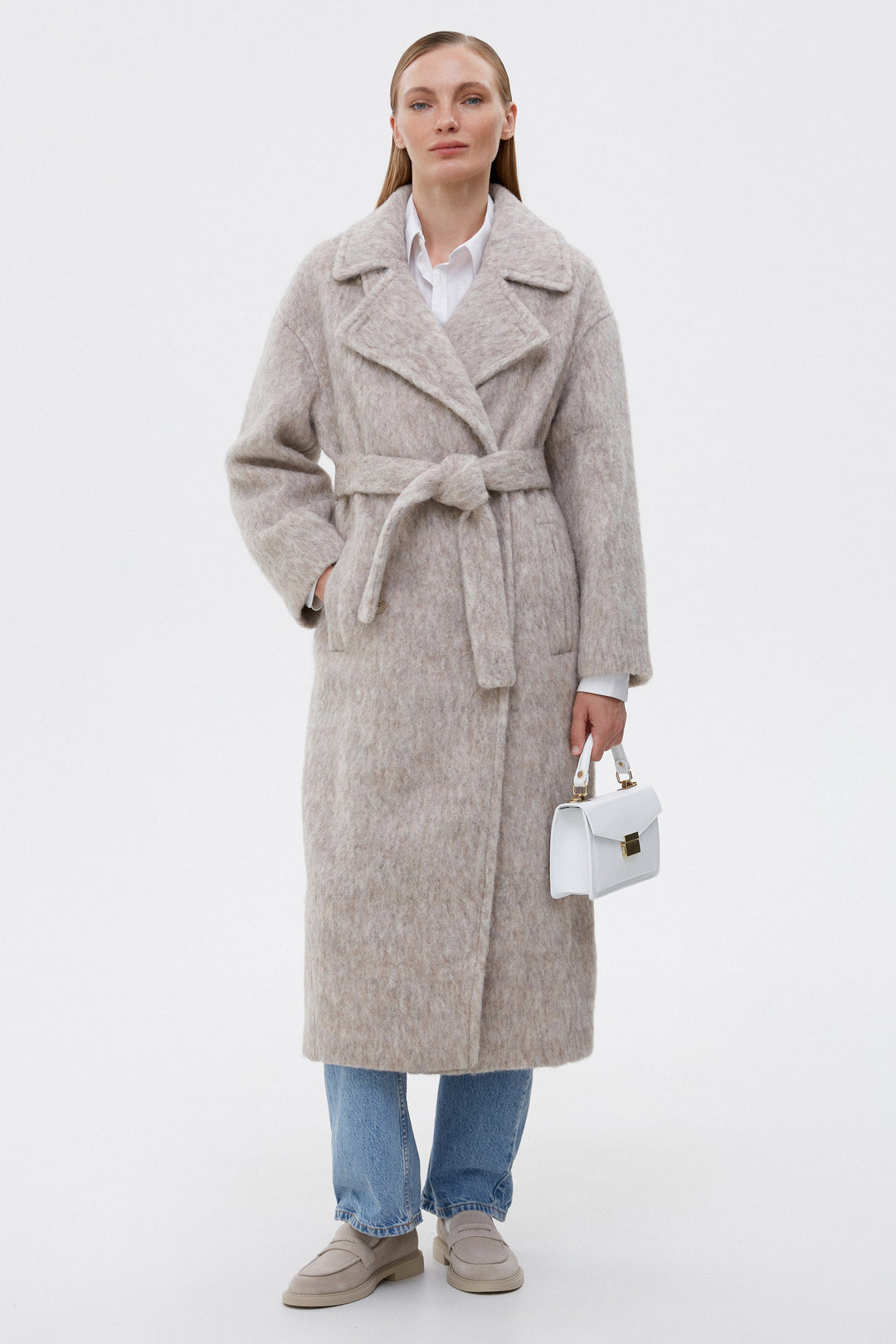 Women's beige belted trench coat with wool blend.