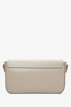 Small women's handbag in beige.