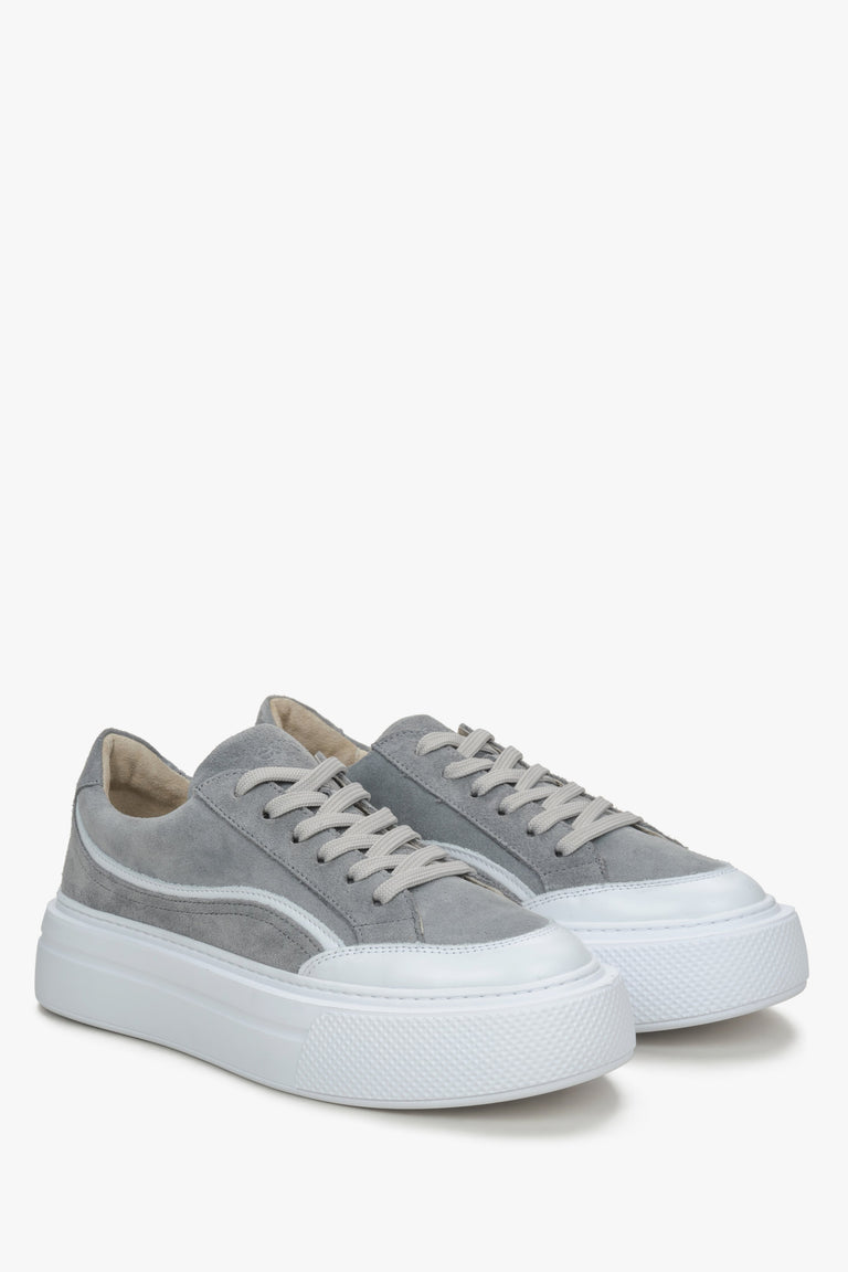 Grey velour women's sneakers with a thick sole.