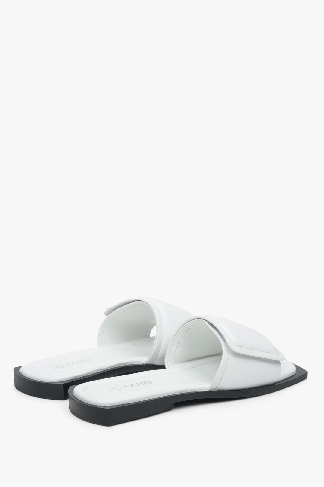 Estro women's slide sandals in white with hook and loop fastening - close-up on shoe sideline.