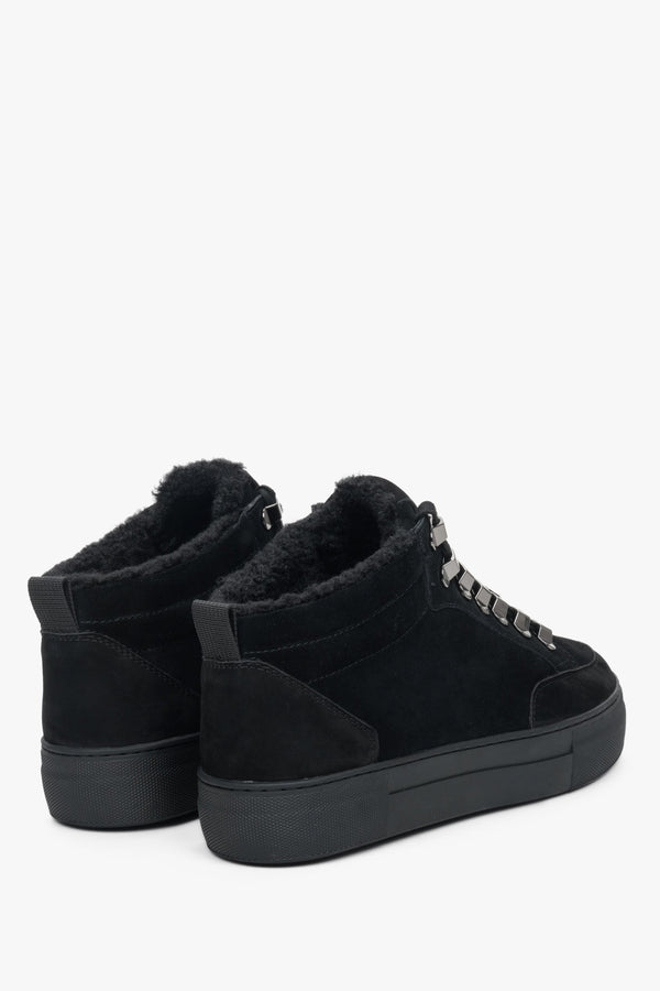 Women's black nubuck winter sneakers by Estro - close-up on the rear part of the shoe and its profile.