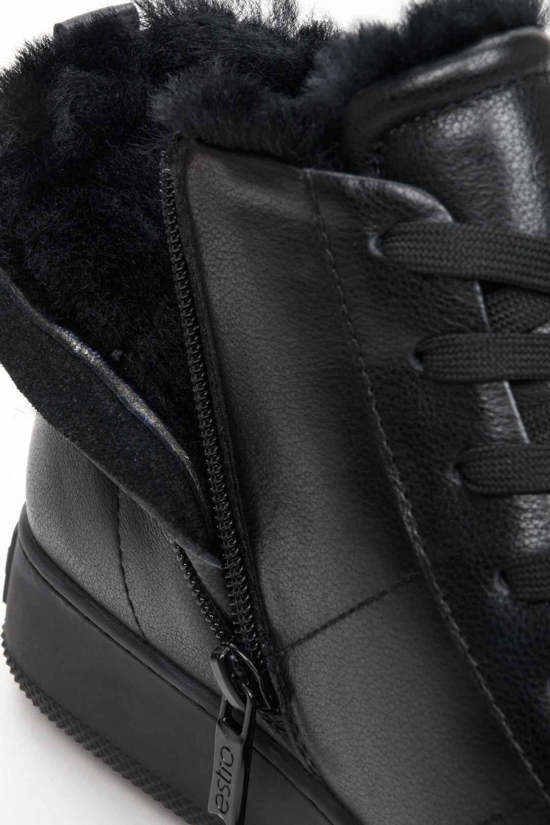 Women's black winter sneakers - close-up on the soft shoe lining.