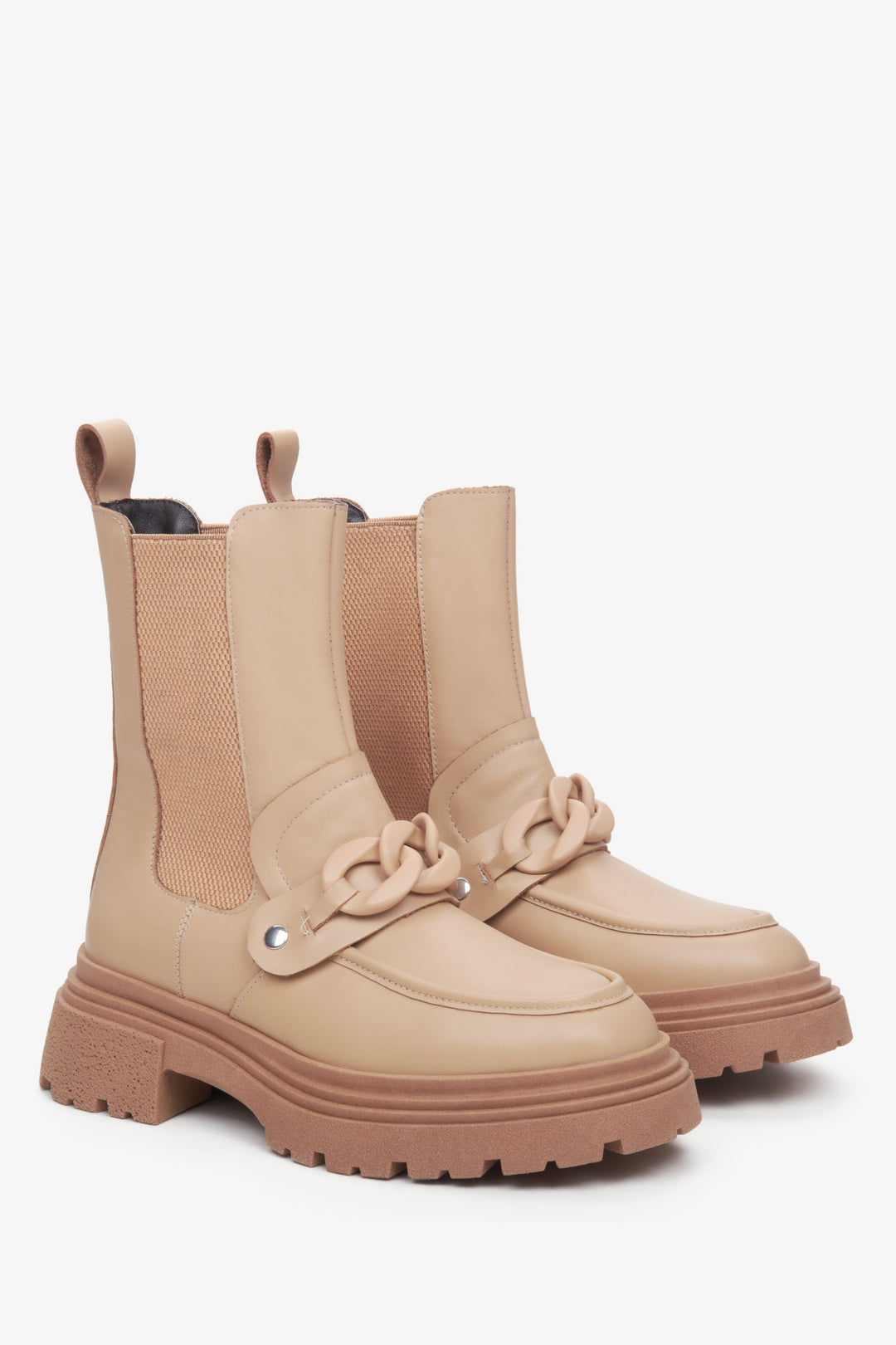 Women's beige leather Chelsea boots with ornament.