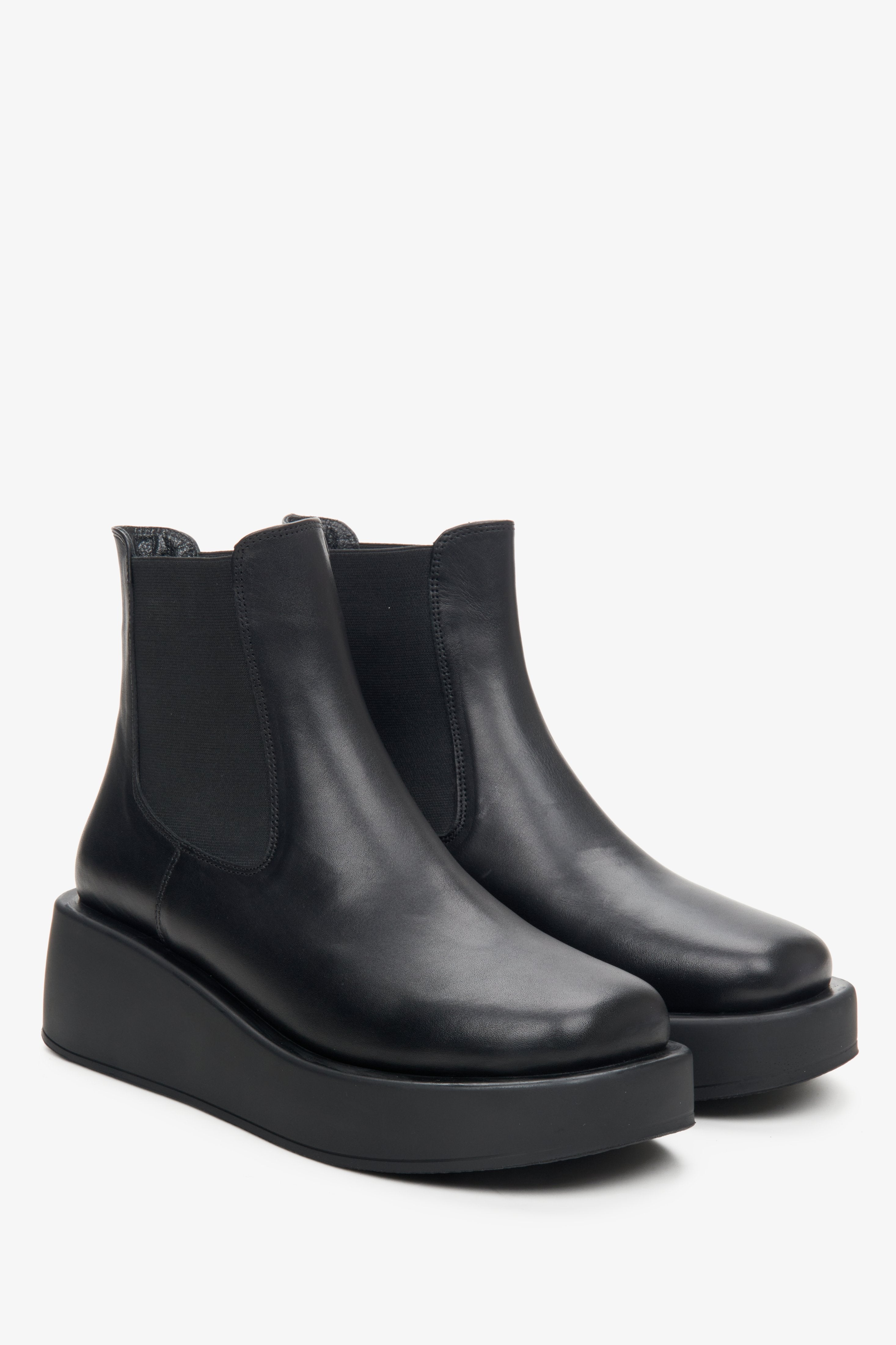 Women's black leather platform boots by Estro - close-up on the toe and side seam of the boot.