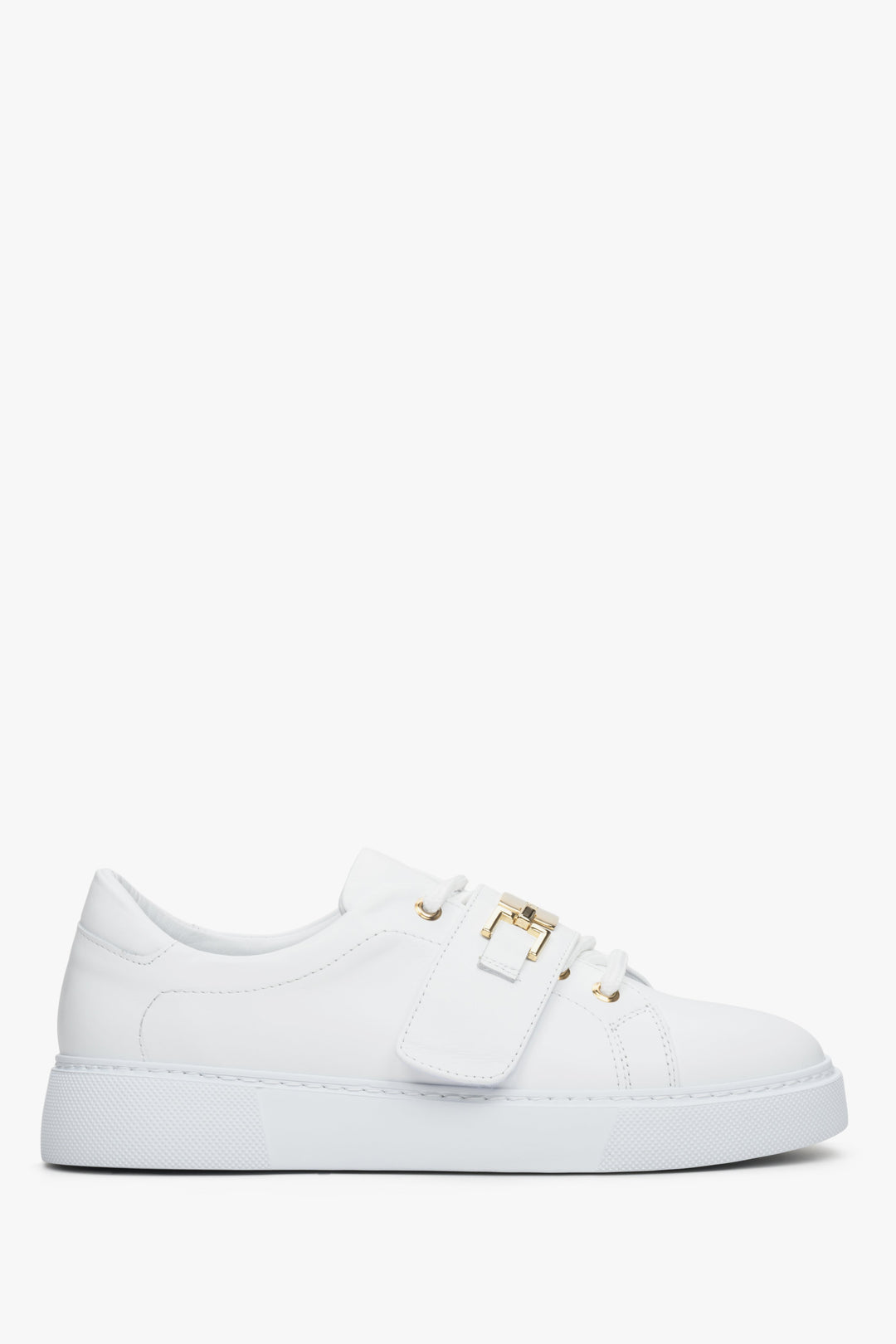 Women's white leather sneakers by Estro with a gold embellishment - shoe profile.