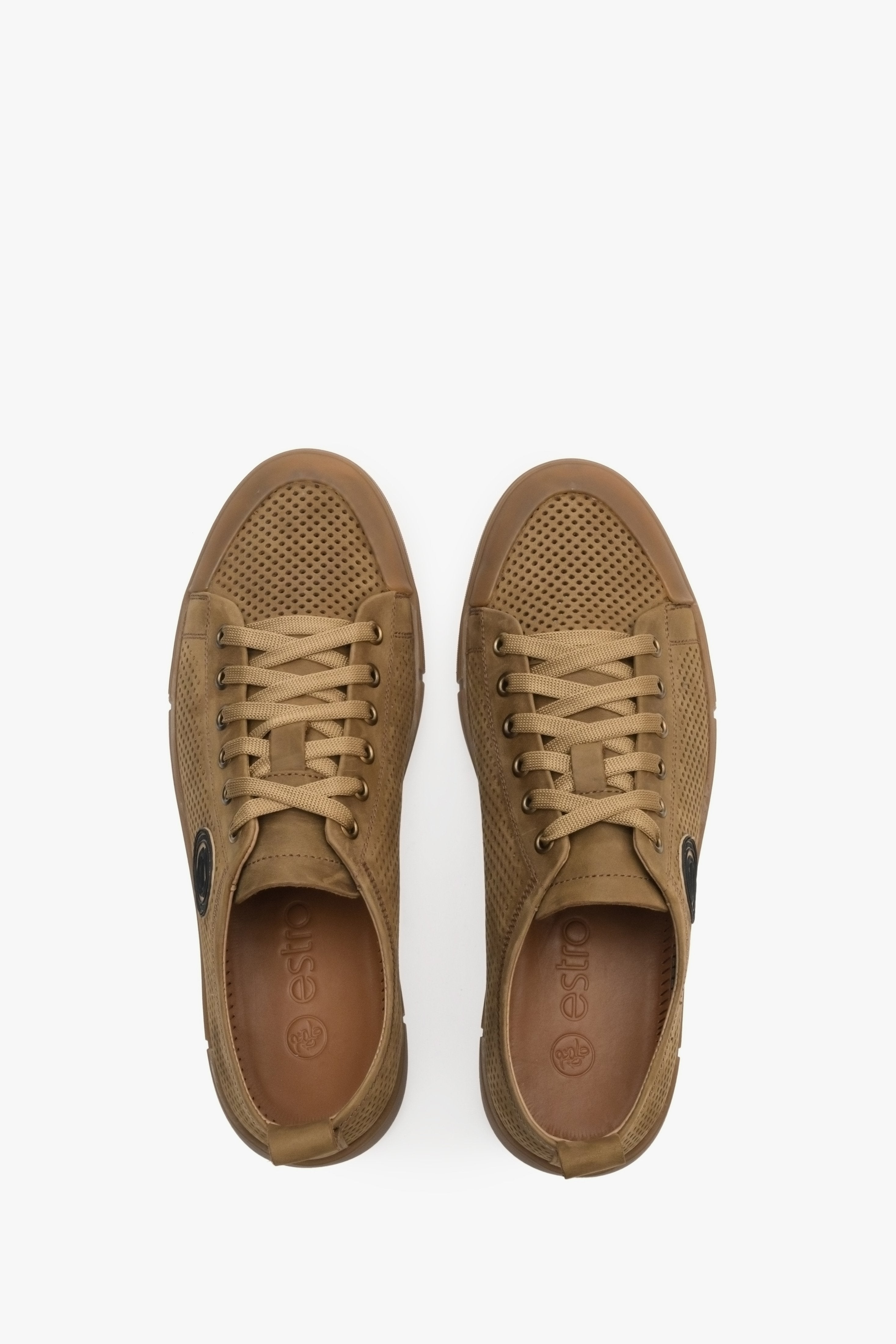 Men's fall sneakers made of brown genuine leather with perforations - top view presentation of the footwear.