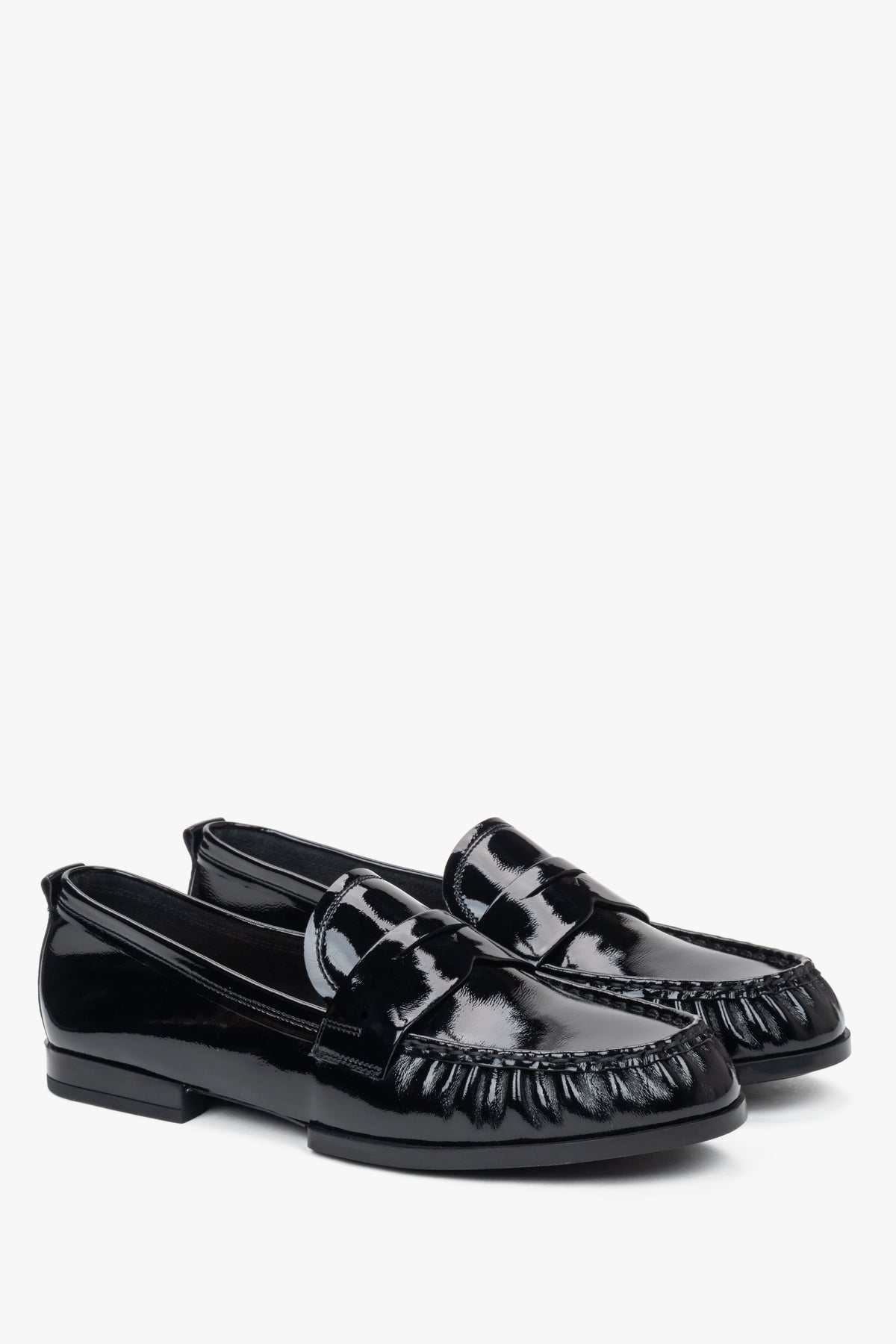 Black patent leather women's loafers made of genuine leather by Estro.