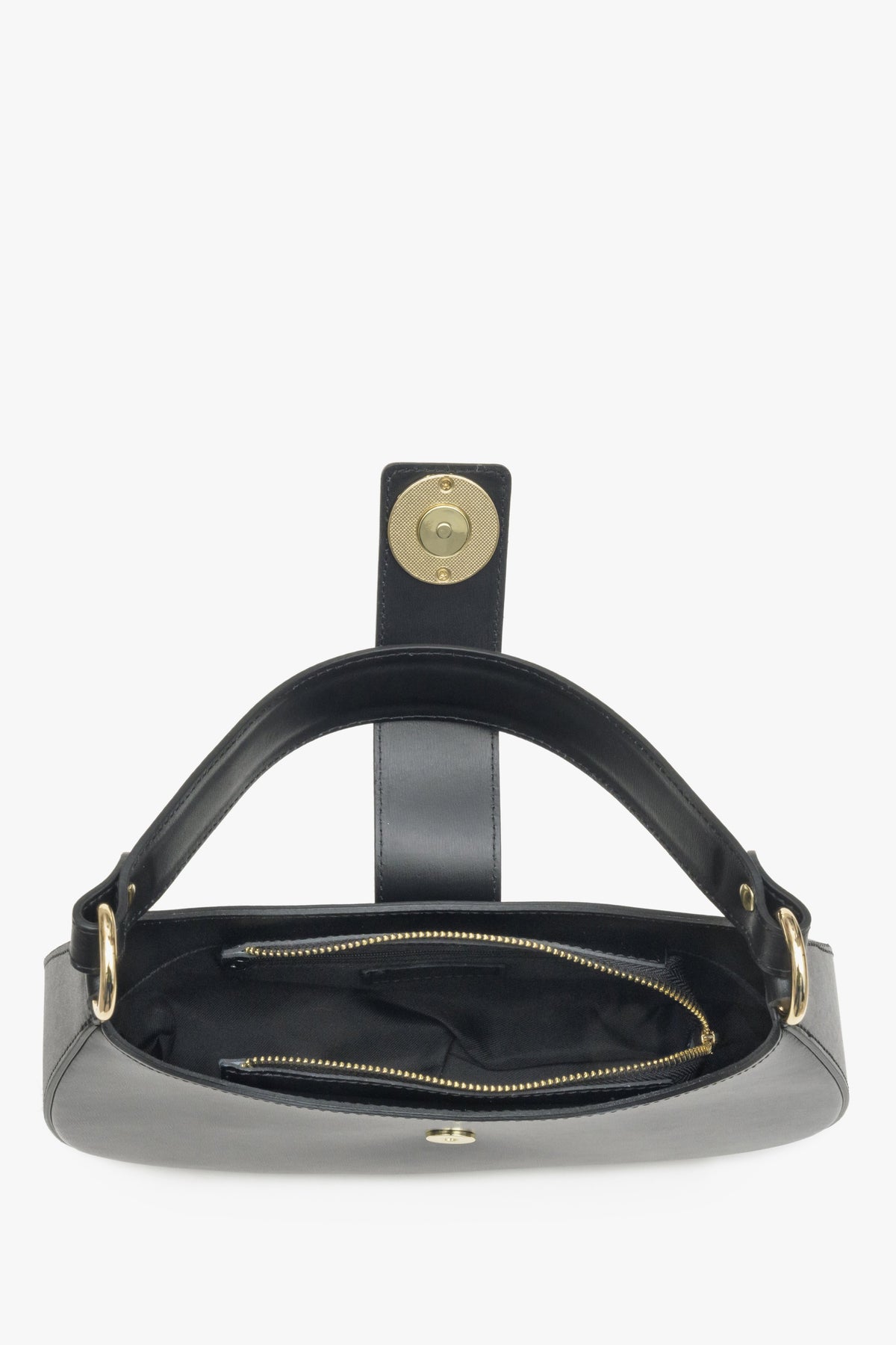 Interior presentation of a black leather  women's handbag.