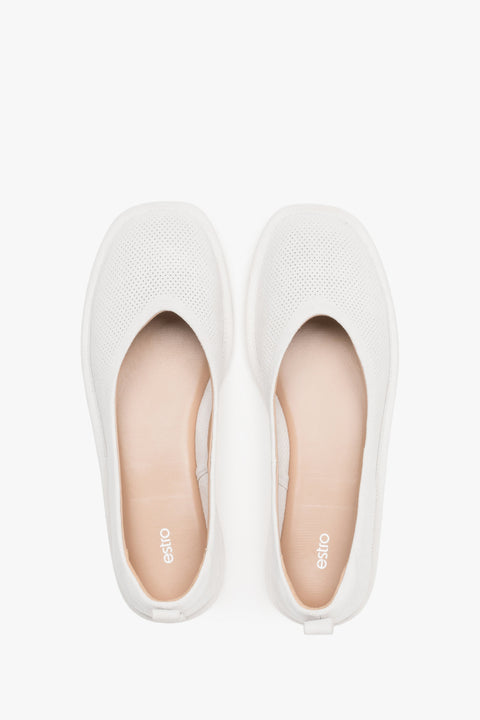 Soft women's ballet flats made of perforated genuine velour in a white shade by Estro – top view presentation.