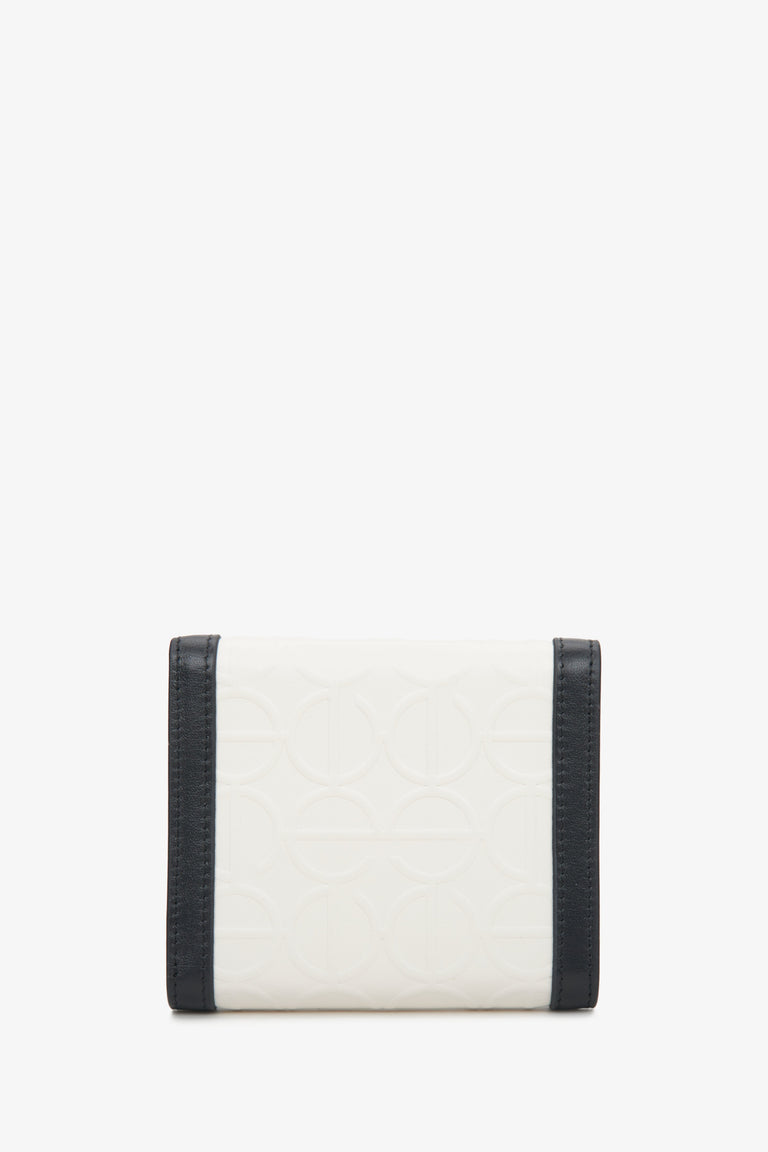 Handy beige-black Estro women's wallet - back side of the model.