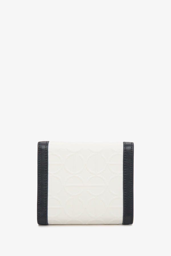 Handy beige-black Estro women's wallet - back side of the model.
