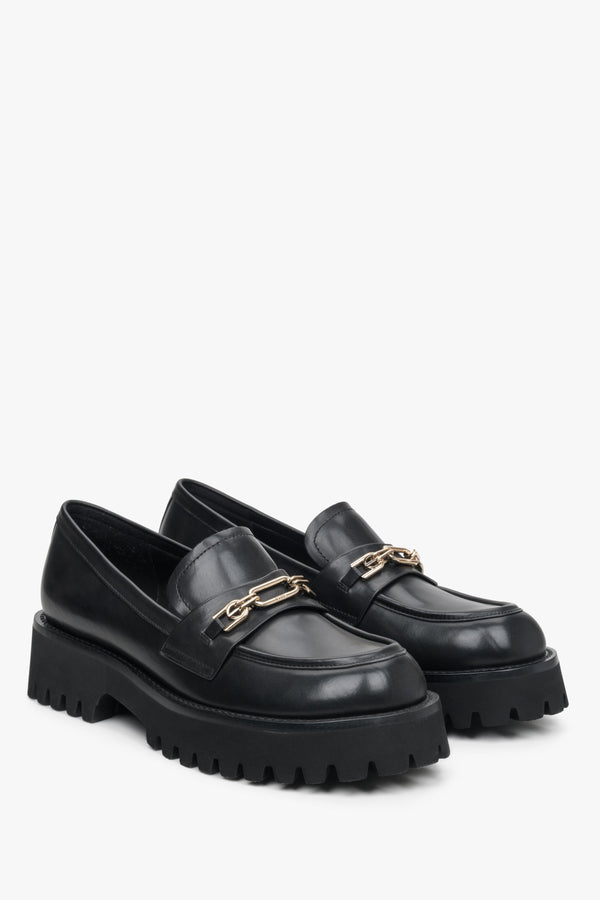 Women's black leather moccasins with a thick sole by Estro.