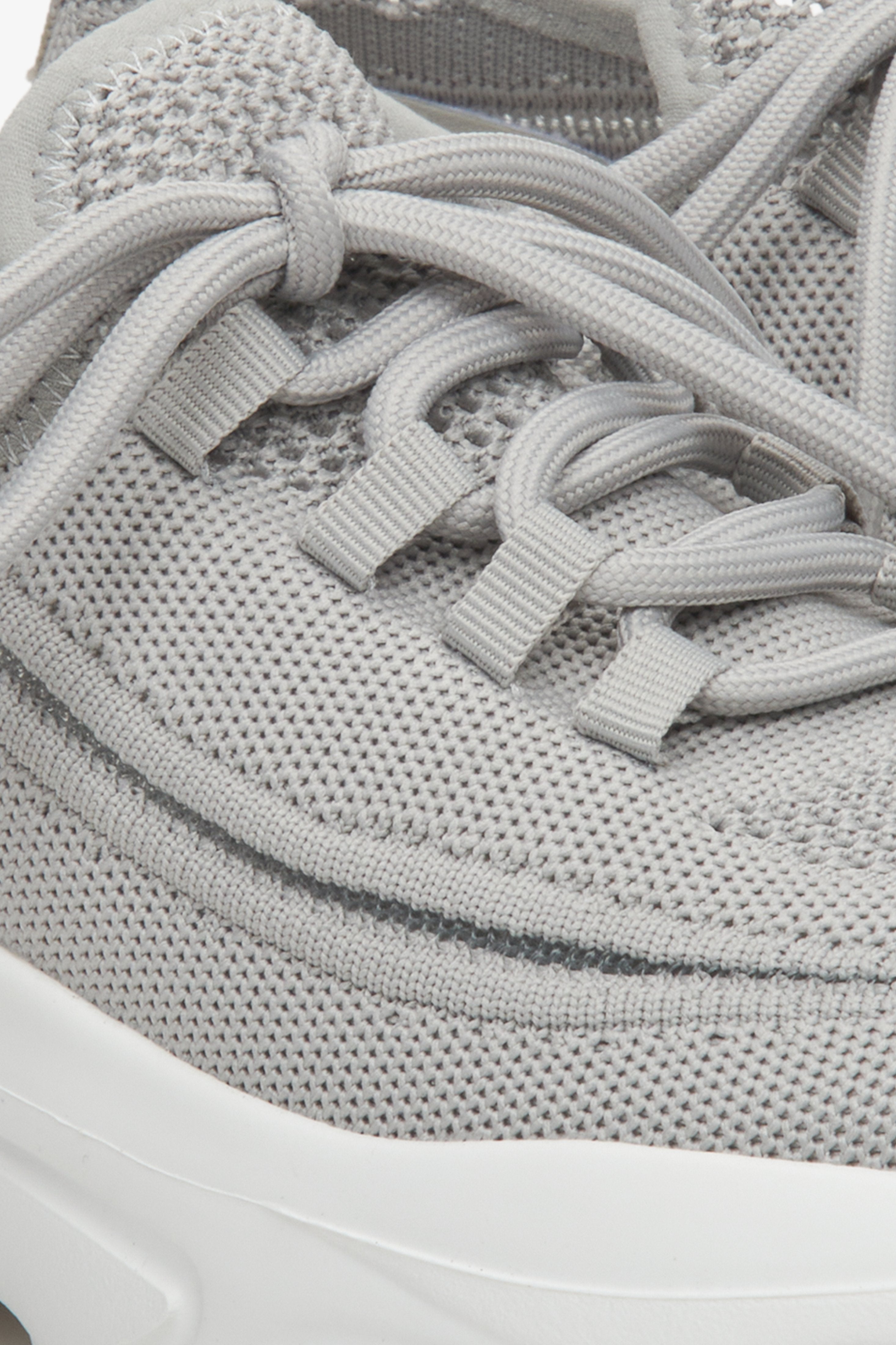 Women's grey mesh and textile sneakers - a close-up on details.