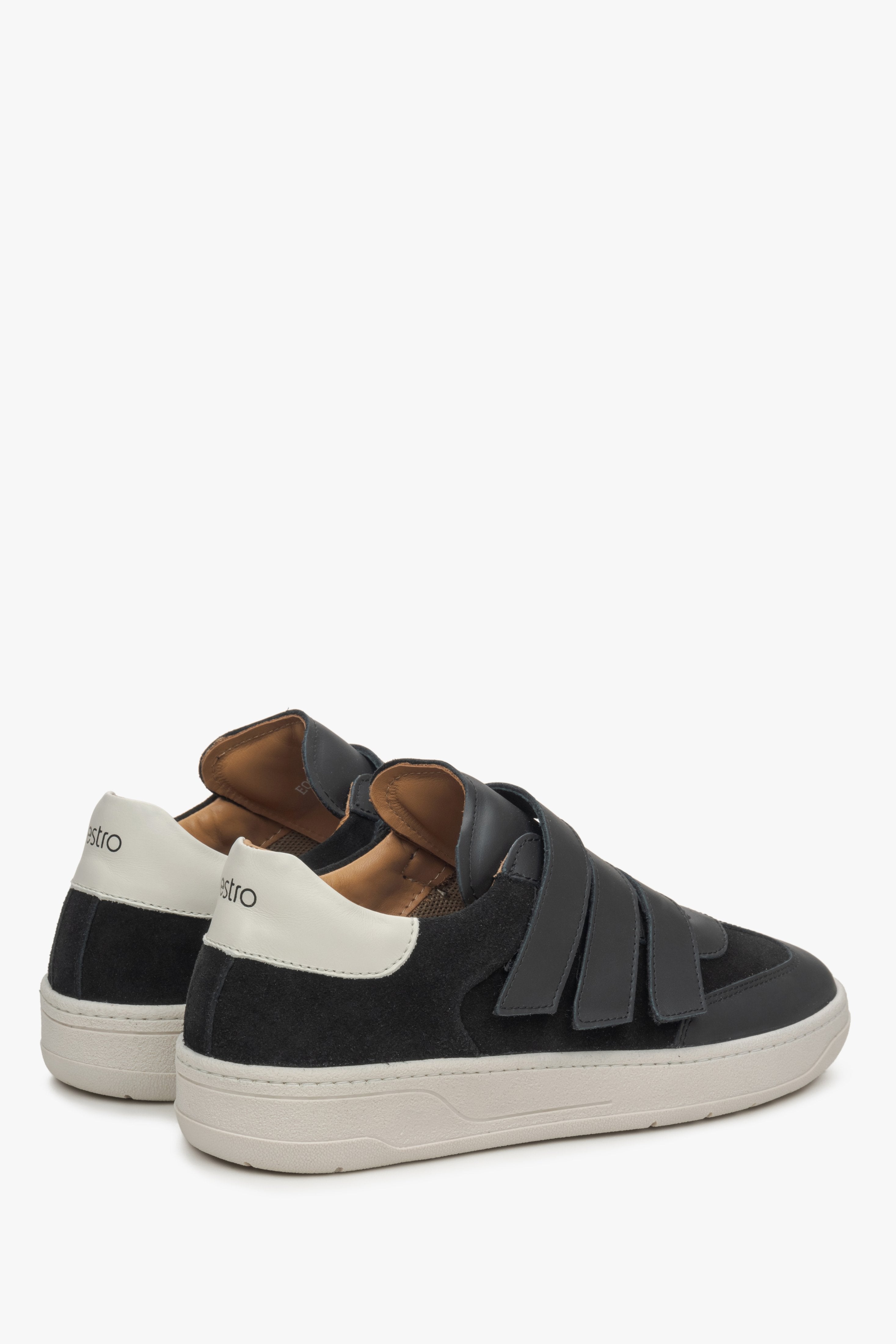 Women's black velcro sneakers Estro - close-up of the heel and side line of the shoes.