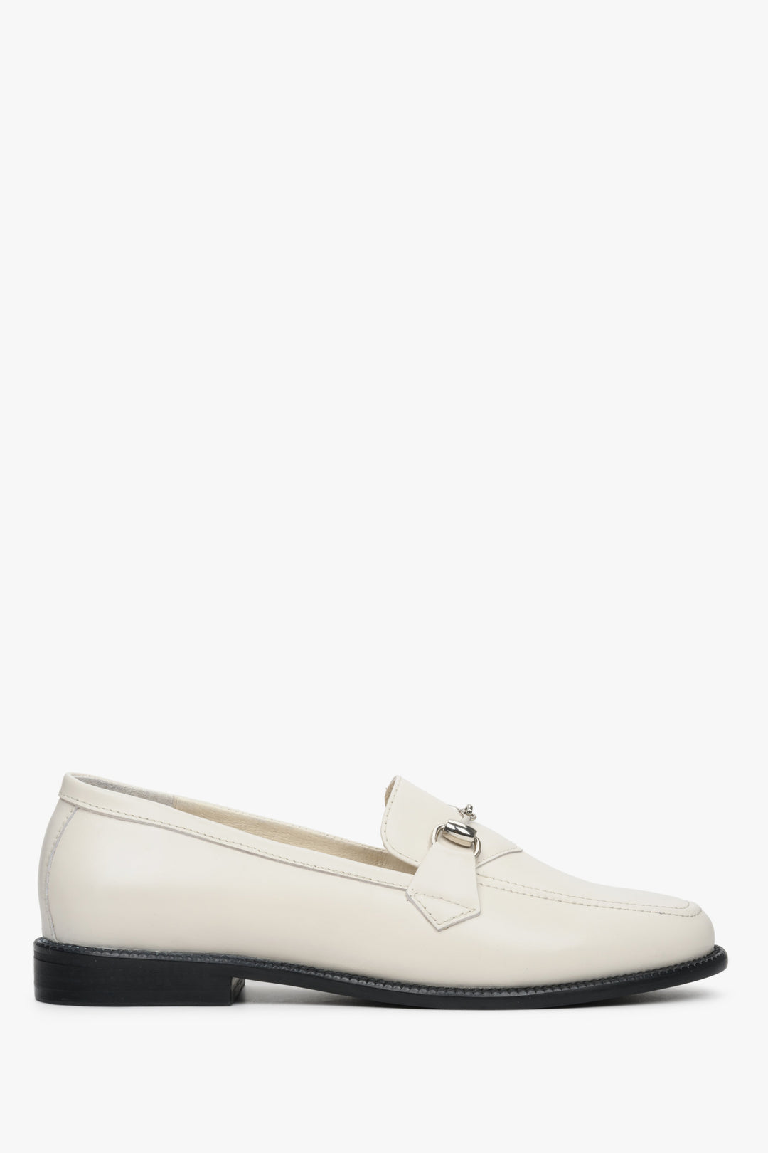 White women's Italian leather loafers with gold buckle - shoe side.