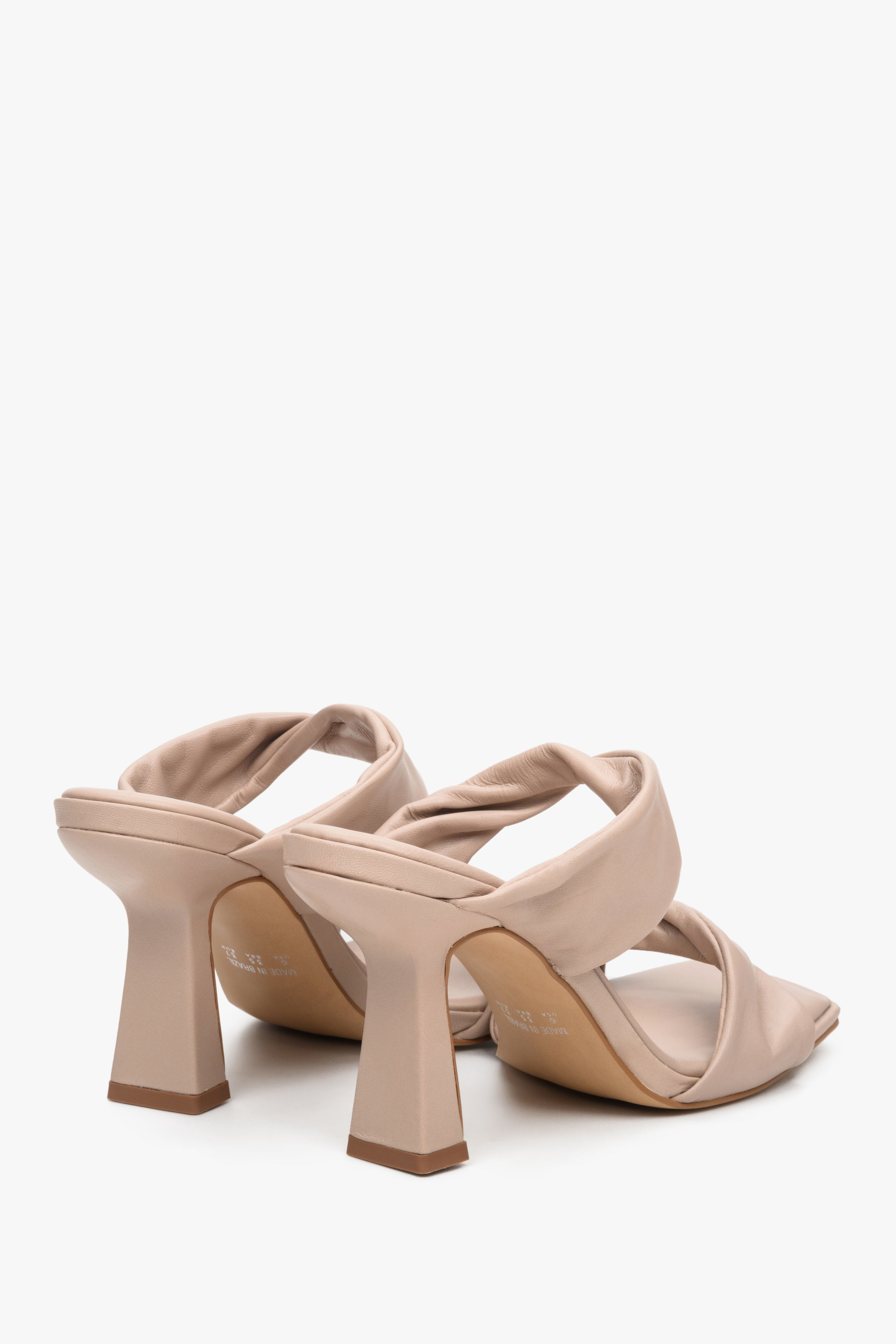 Women's beige leather heeled sandals - close-up on the heel.