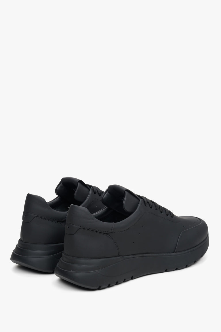 Women's black matte leather sneakers by Estro - close-up on the side line and heel.