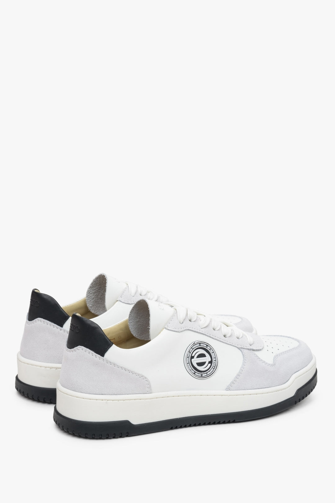 Grey-and-white leather women's sneakers with laces by Estro - close-up on the heel and side seam.