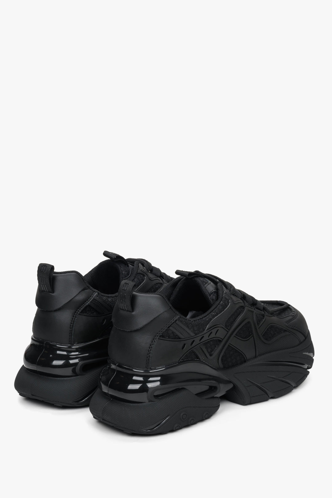Women's black sneakers with a chunky sole.